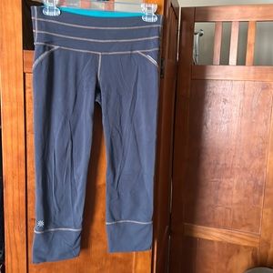 Athleta Workout Pants with Back Zipper and Side Reflective Stripes